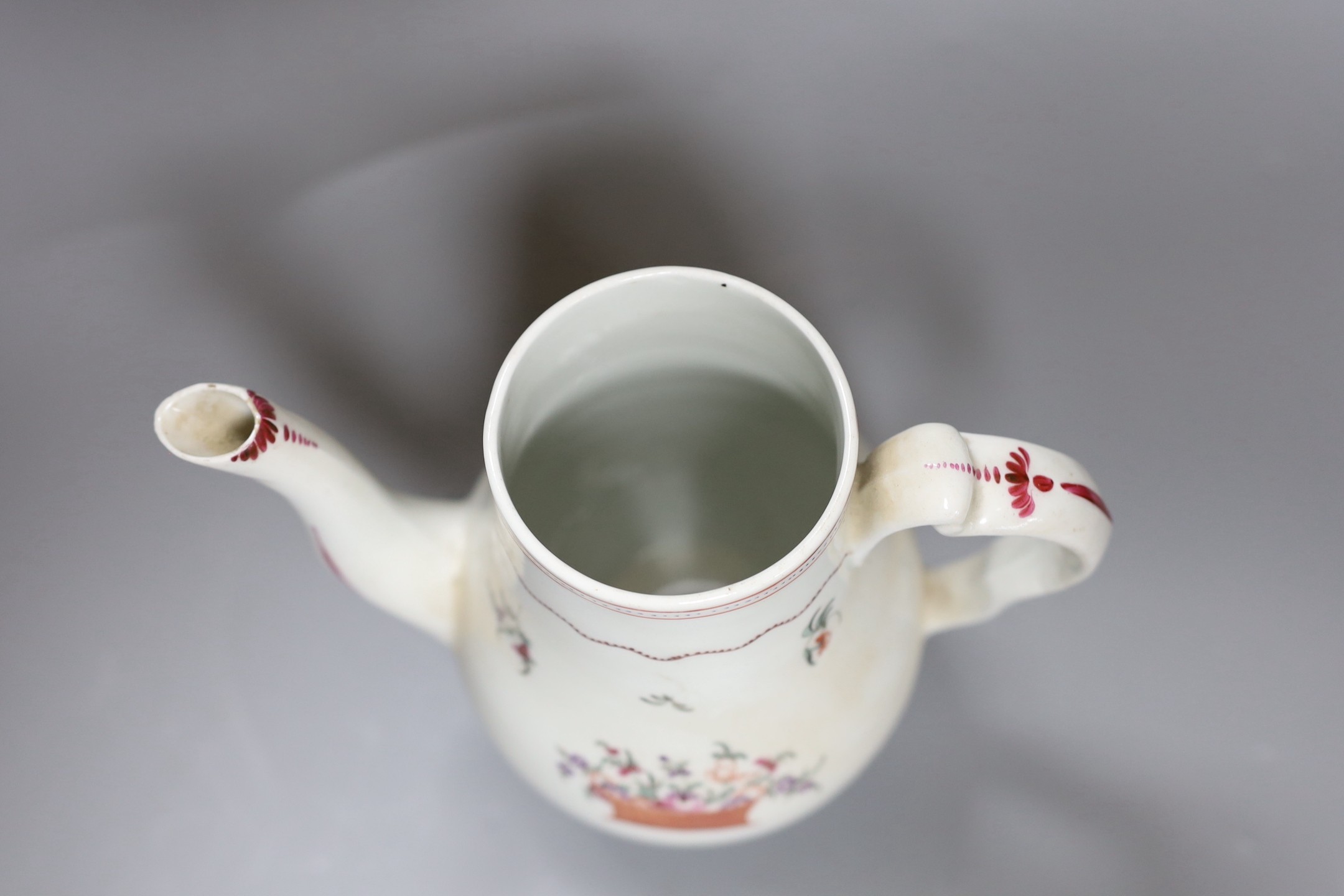 A Chinese export famille rose coffee pot and cover, circa 1800, 25 cms high